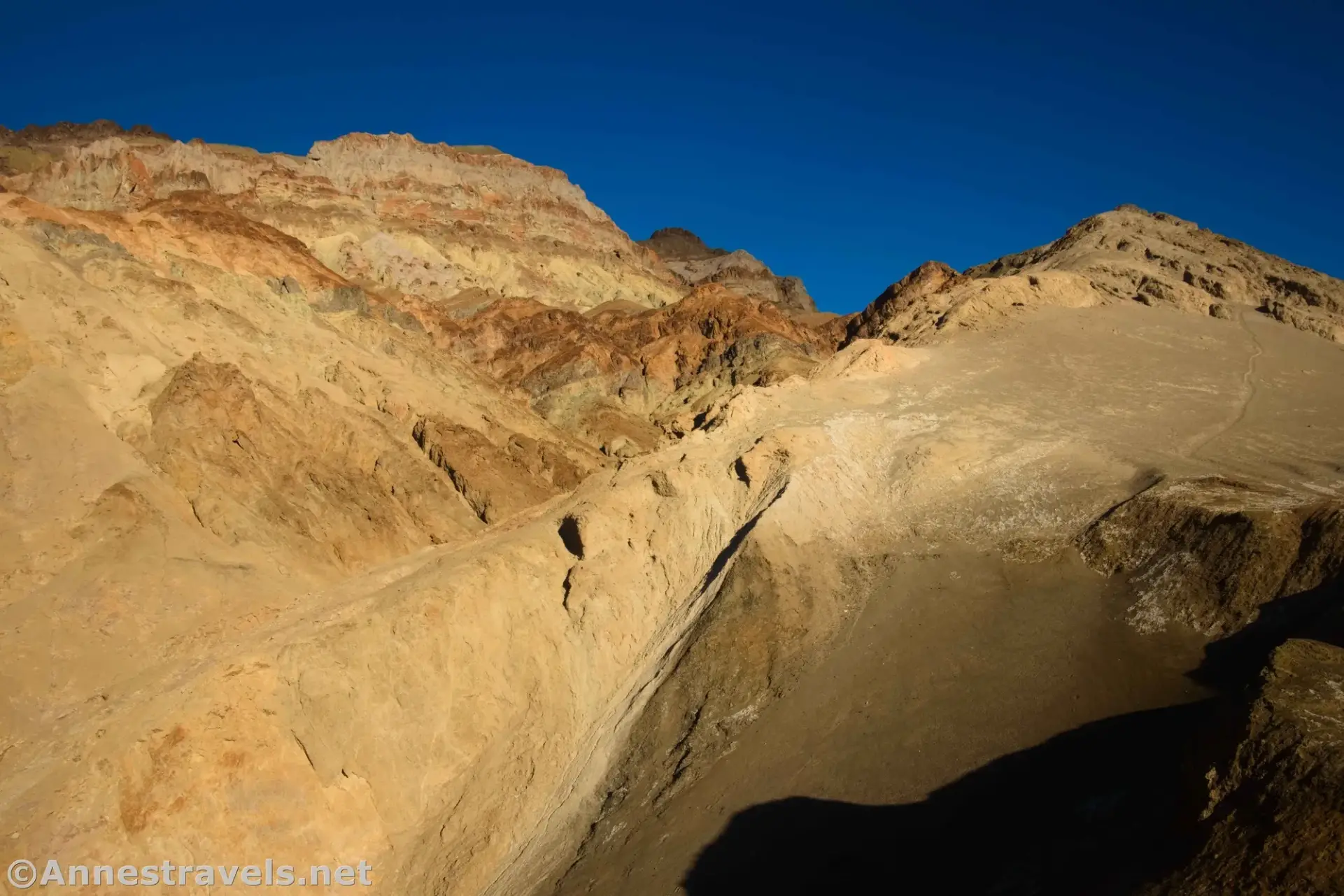 Yellow mountains above in Desolation Canyon, Death Valley National Park, California